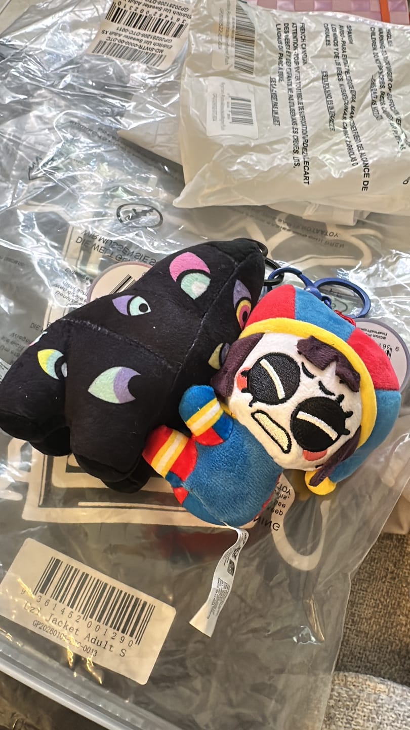 Customer photo review of Pomni & Abstraction Magnetic Plush Keychains