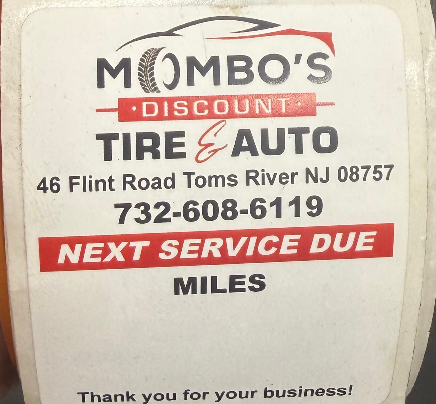 Customer photo review of Custom Oil Change Stickers for Windshield with Logo