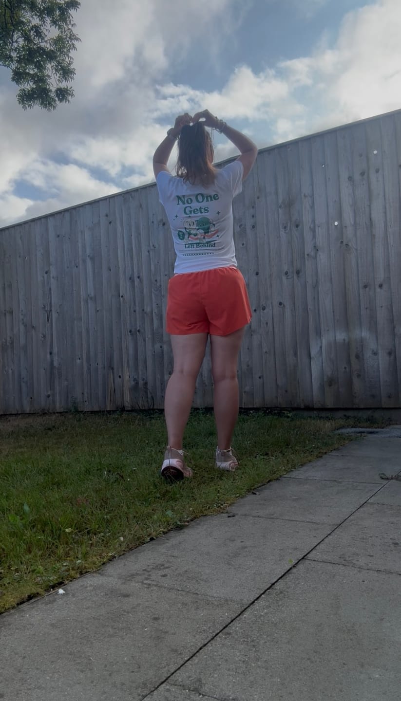 Customer photo review of No One Gets Left Behind Women’s Activewear T-Shirt