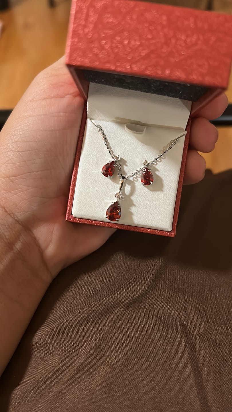 Customer photo review of Solitaire 2-Stone 1ct Pear CZ Set in Sterling Silver
