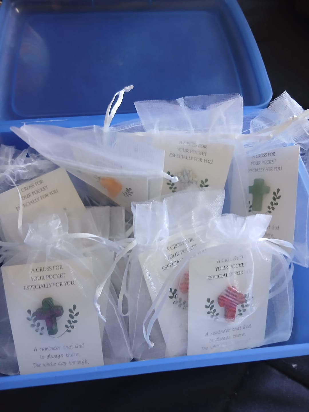 Customer photo review of Christianartworkshop 24/48/80-Piece Assorted Pocket Cross Set: Random-Material Tokens of Divine Presence