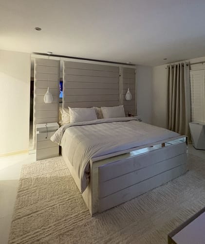 Customer photo review of Buckingham Wide Extended Headboard Mirror Stripe Line Panelled Bed