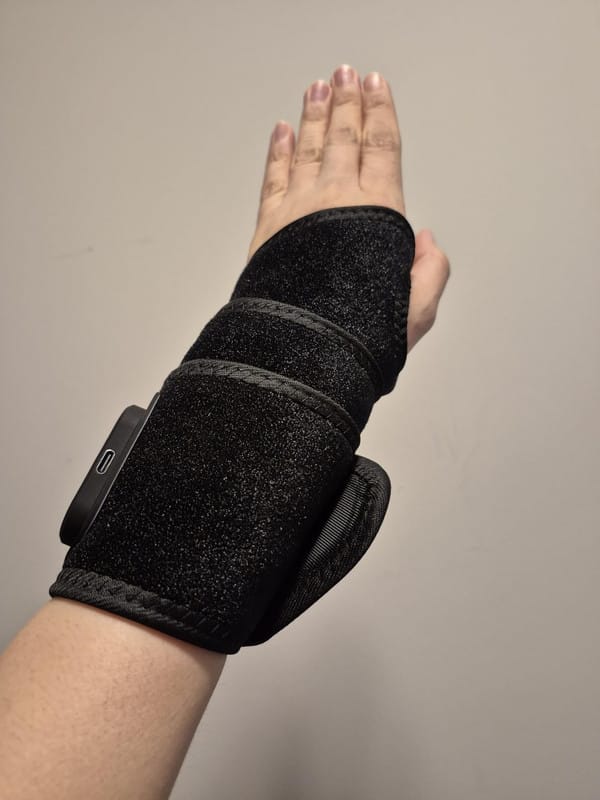 Customer photo review of ZyaVie™ 3-in-1 Red Light Wrist Wrap