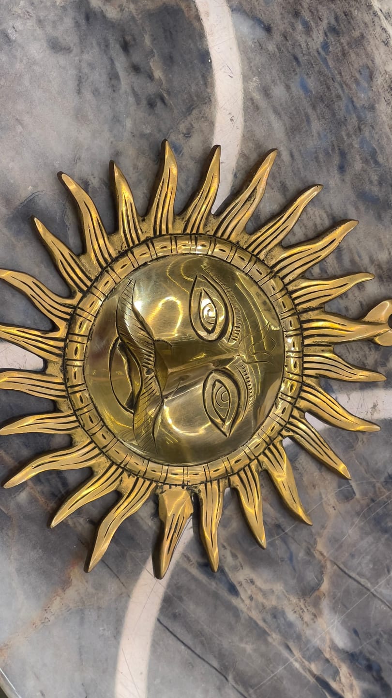 Customer photo review of Brass Surya (Sun) Ji Wall Hanging Idol Vastu Remedy for East Direction Balance, Fame and Positive Energy | 24 X 24 cm | 1 kg
