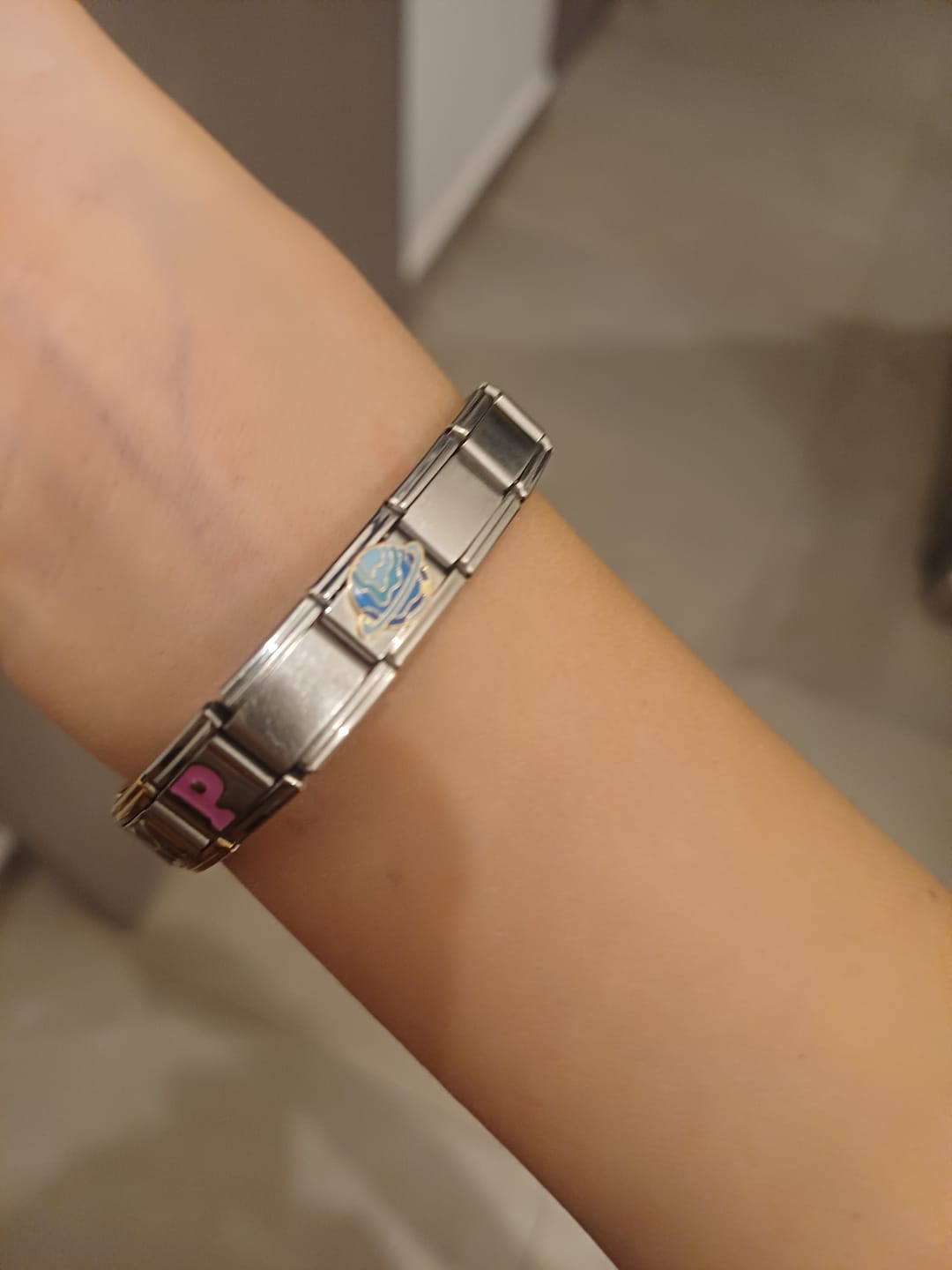 Customer photo review of Charm Planeta Saturno Azul