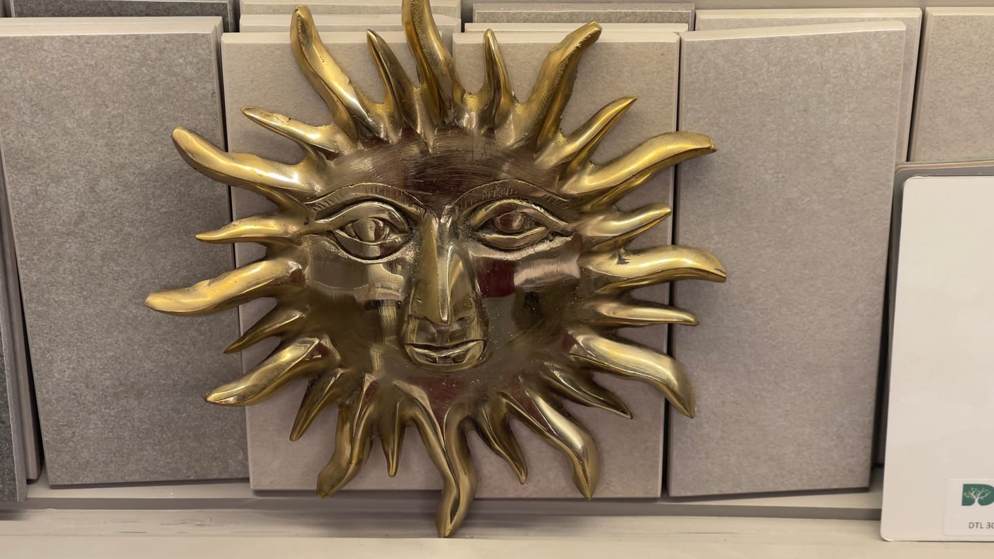 Customer photo review of Solid Brass Sun Face Wall Idol | Vastu Remedy for East Direction Prosperity & Fame | Main Door, Living Room & Office | 24 × 24 cm | 1 kg