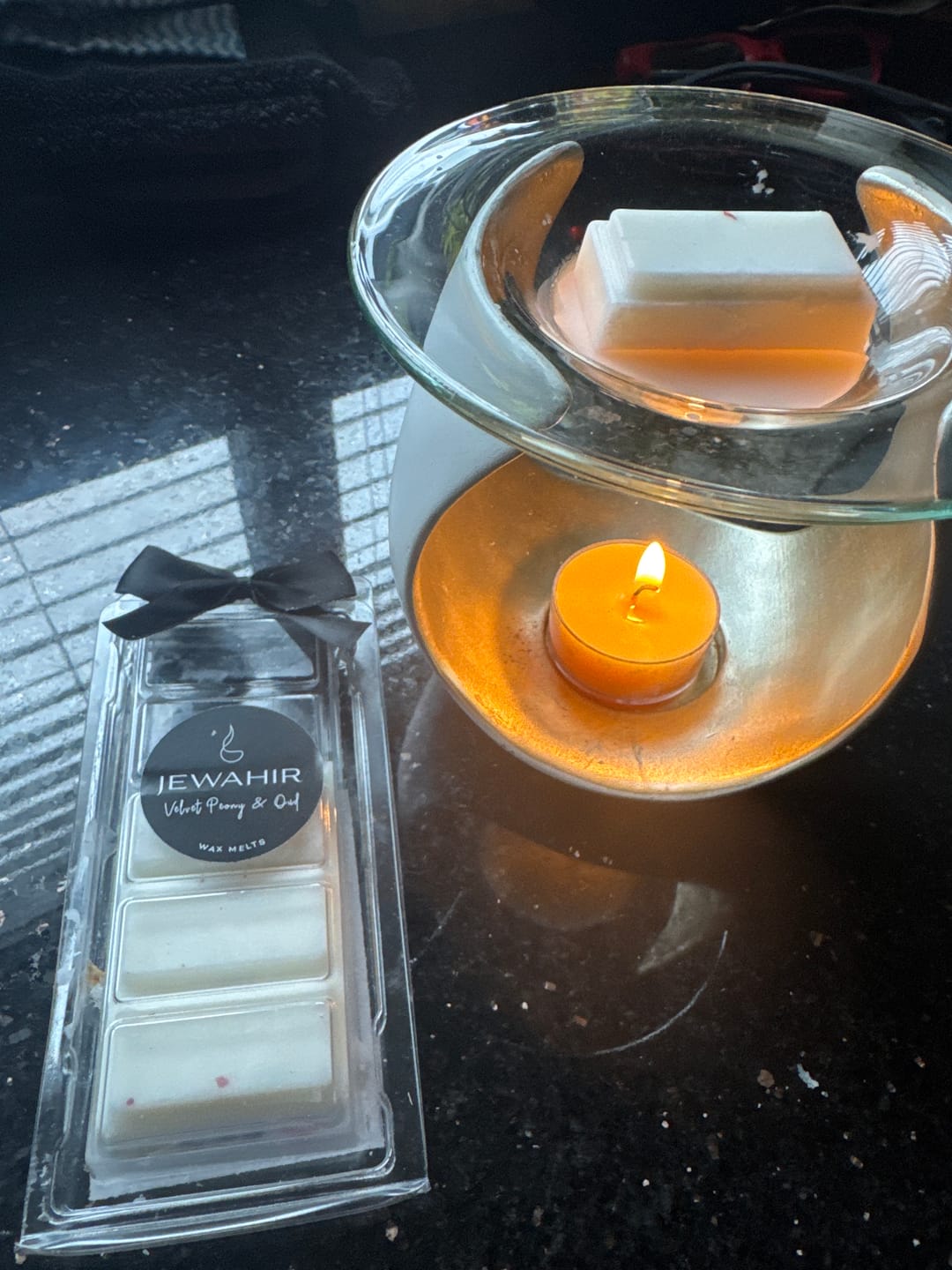 Customer photo review of Velvet Peony & Oud Wax Melts