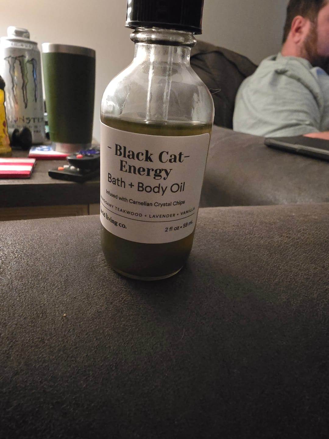 Customer photo review of Black Cat Energy Bath & Body Oil