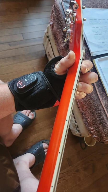 Customer photo review of ZyaVie™ 3-in-1 Red Light Wrist Wrap