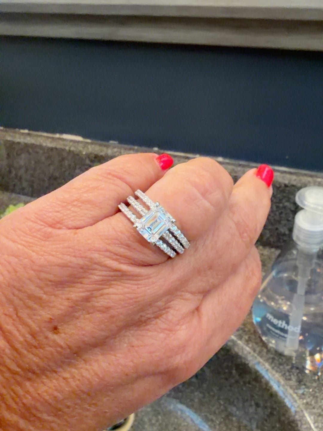 Customer photo review of Solitaire 2.6ct Emerald Cut CZ Ring Set in Sterling Silver