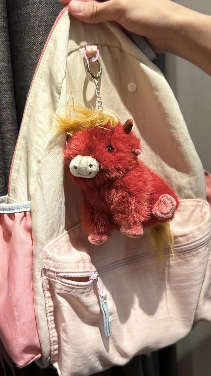 Customer photo review of Highland Cow Bag Charm