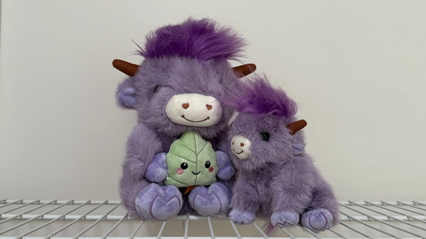Customer photo review of Highland Cow Bag Charm
