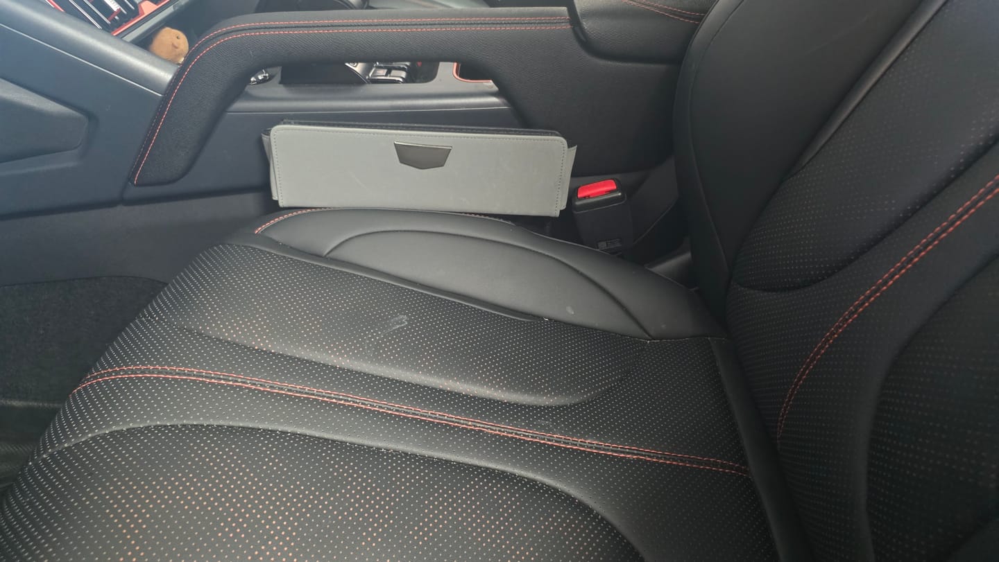 Customer photo review of Car Seat Gap Filler & Pocket Organizer