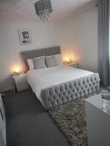 Customer photo review of Elijah Chesterfield Upholstered Fabric Bed