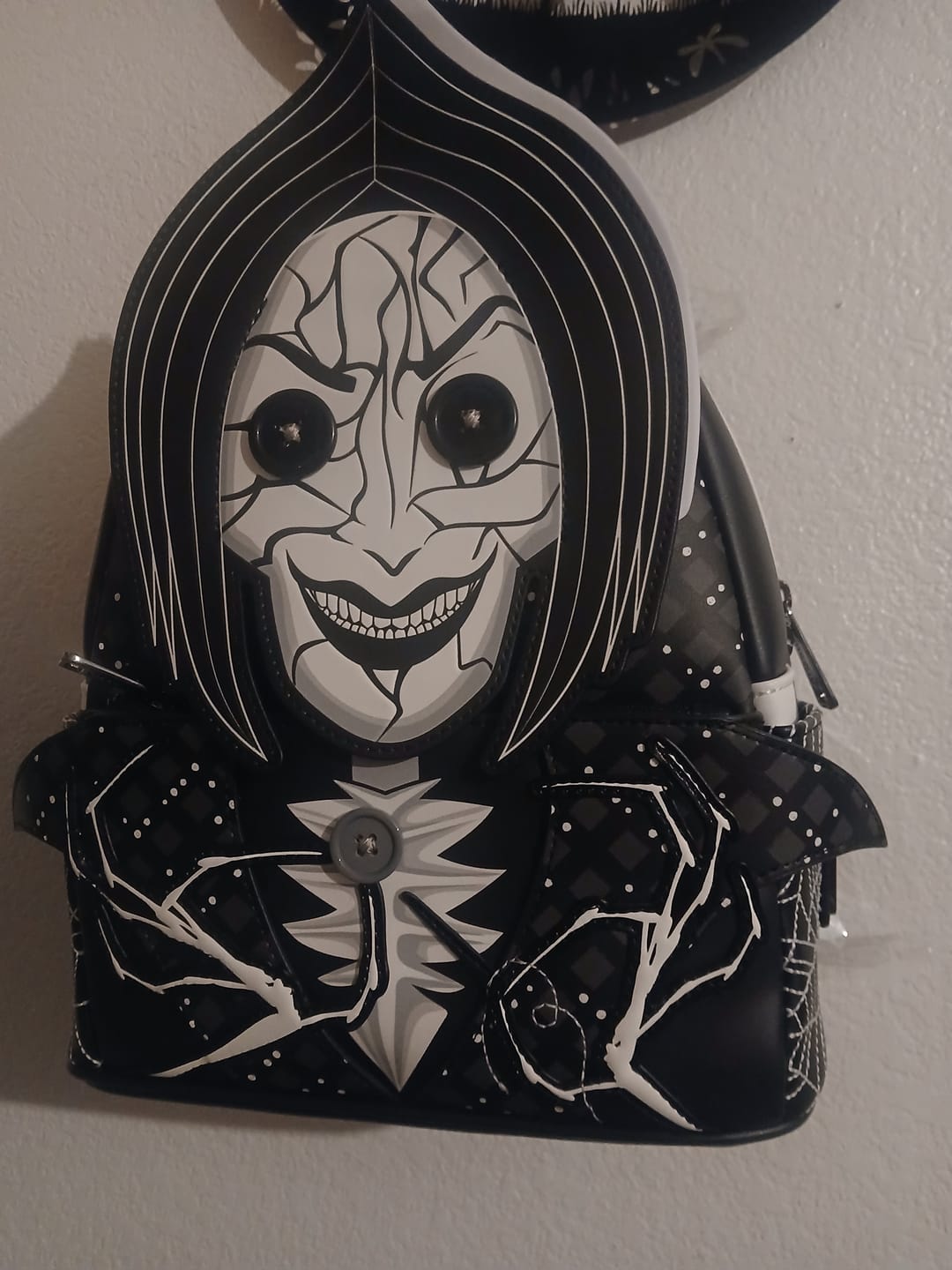 Customer photo review of Loungefly Laika Coraline Other Mother Glow Cosplay Mini Backpack