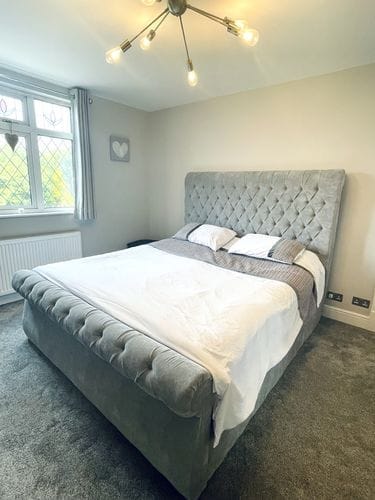 Customer photo review of Daisy Swan Style Chesterfield Scroll Sleigh Bed