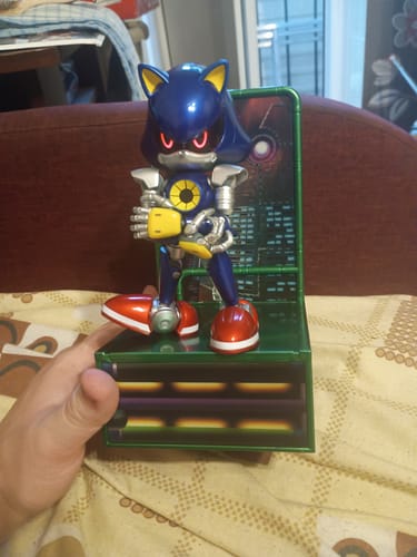 Customer's Modern Metal Sonic figure standing on its green display base