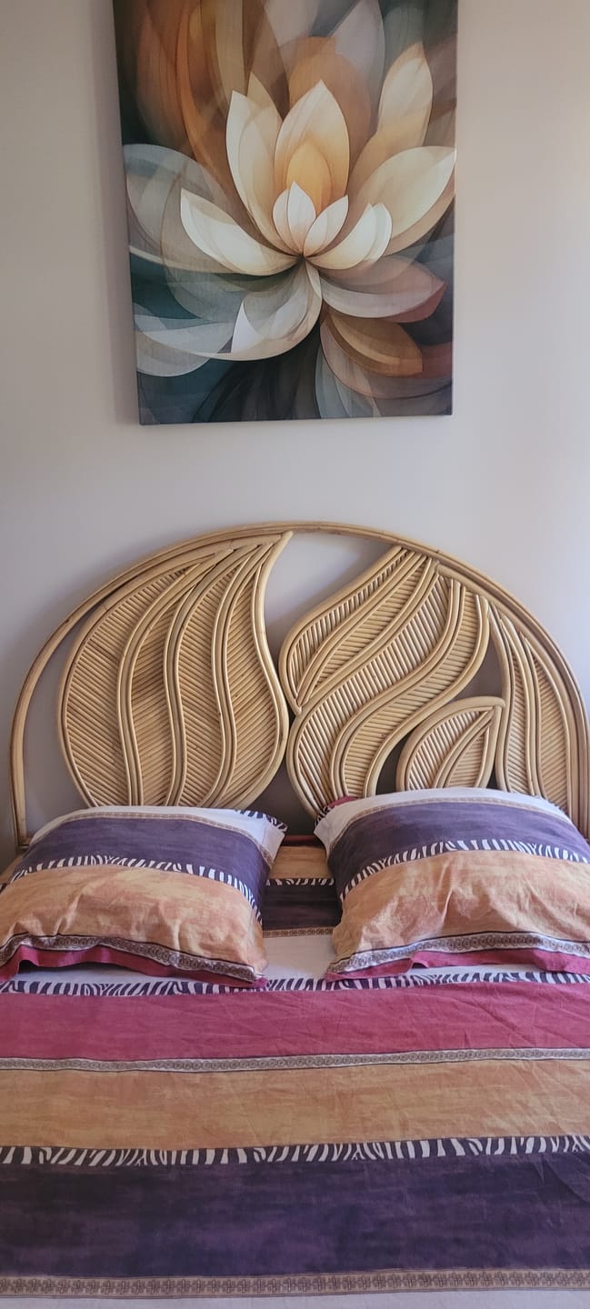 Customer photo review of SAMARINDA - Tête de lit 140 cm en rotin naturel