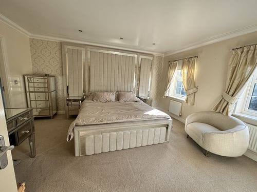 Customer photo review of Windsor Wide Extended Headboard Mirror Stripe Panelled Bed