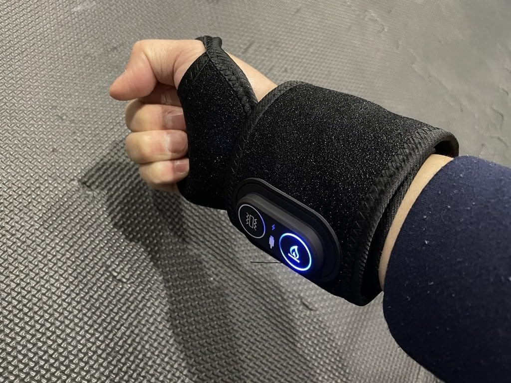 Customer photo review of ZyaVie™ 3-in-1 Red Light Wrist Wrap