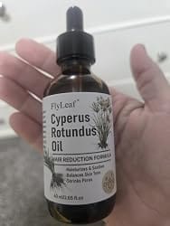 Customer photo review of HerbaSmooth™ Hair Care Oil