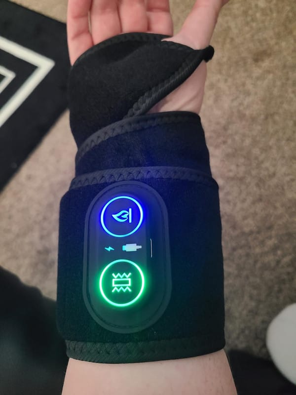 Customer photo review of ZyaVie™ 3-in-1 Red Light Wrist Wrap