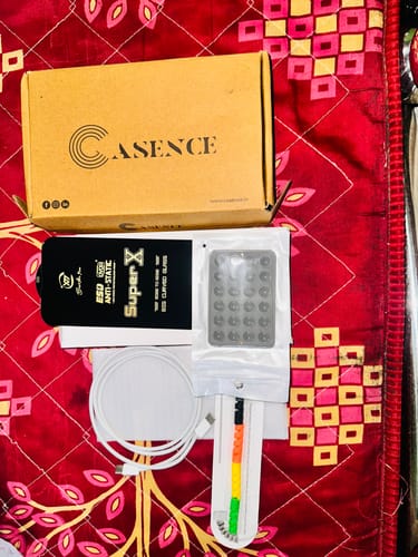 Customer's Casence Armor charging cable, screen protector kit, and cardboard packaging on a patterned surface