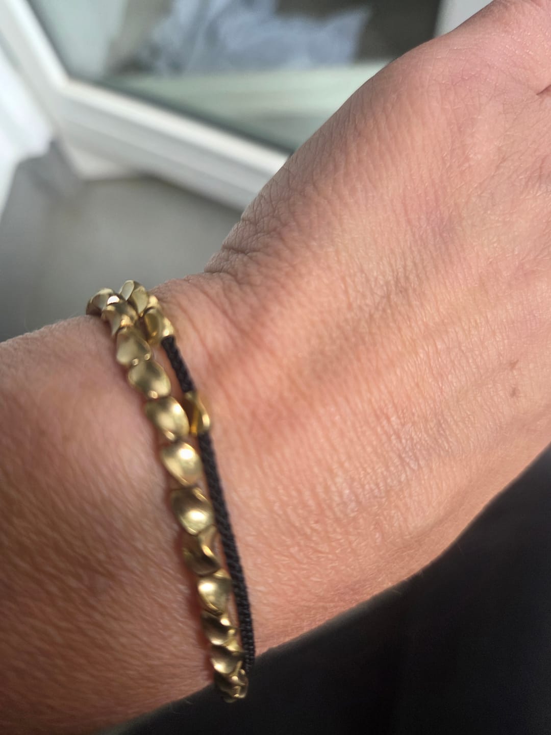 Customer photo review of Handgemachtes Tibetisches Glücks-Armband aus Kupfer