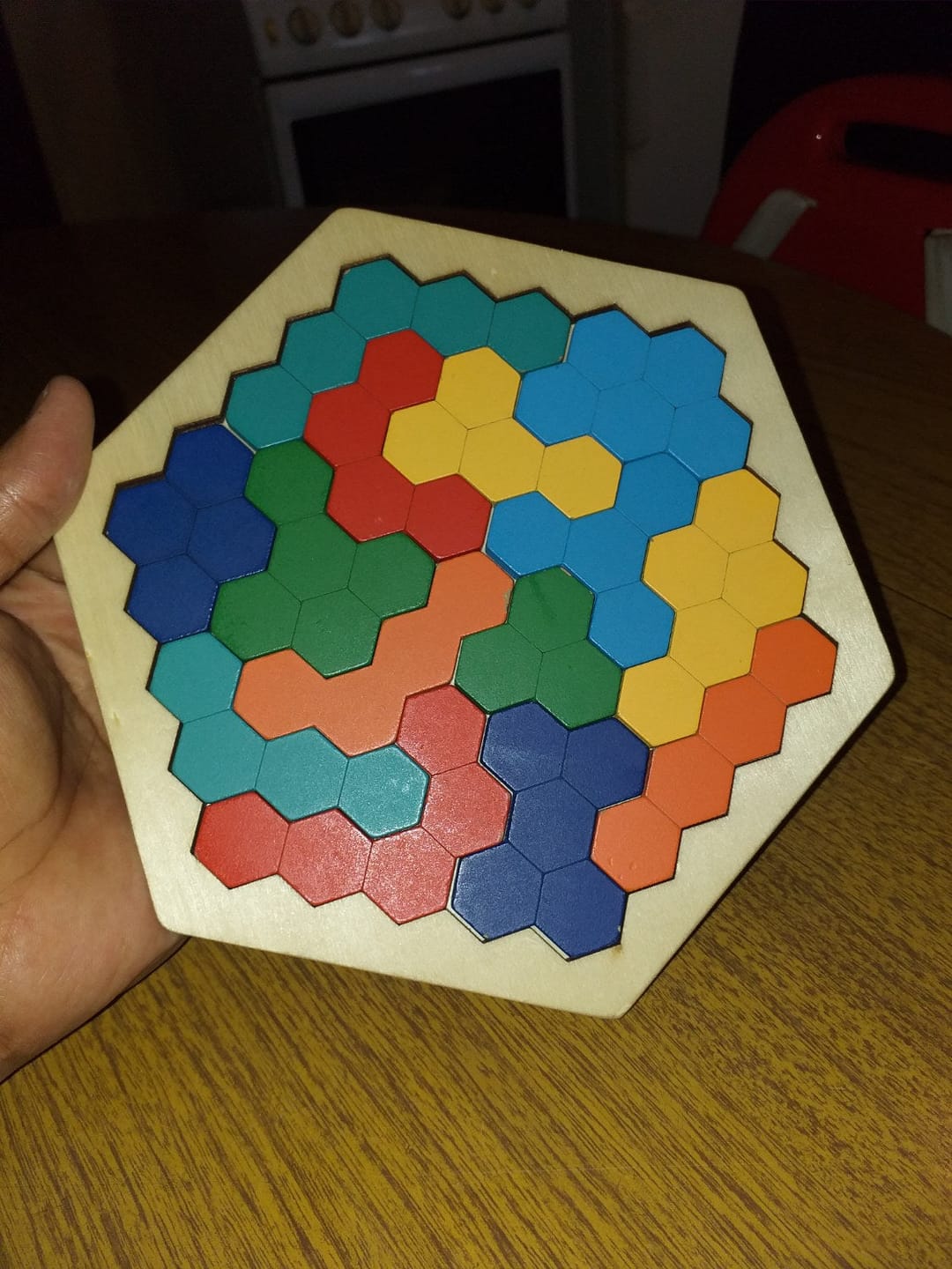 Customer photo review of Holz Hexagon Puzzle Lernspielzeug | Kognitives Motorikspiel Geometrie Kleinkind