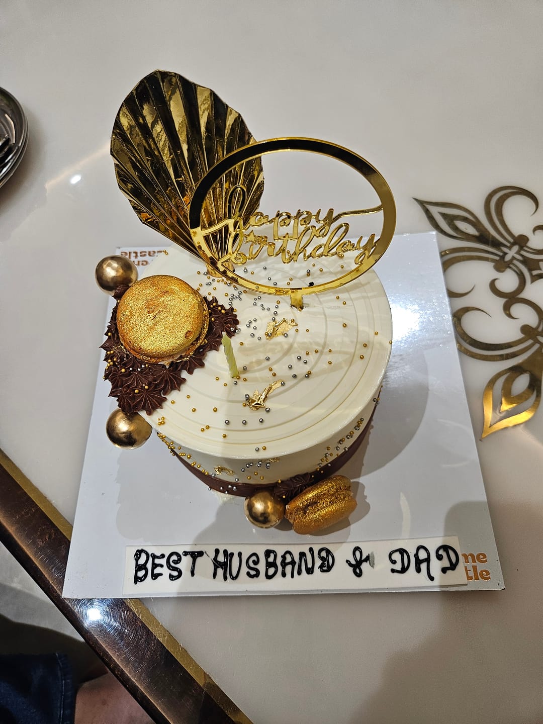 Customer photo review of Golden cake for boyfriend birthday