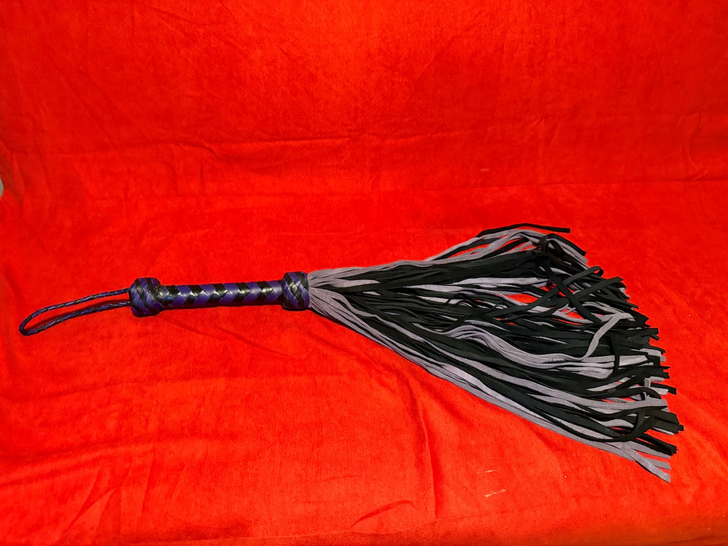 Customer photo review of 💜🖤Real Cowhide Suede Leather Flogger 100 Falls Purple and Black Heavy Duty Thuddy Whip | BDSM Impact