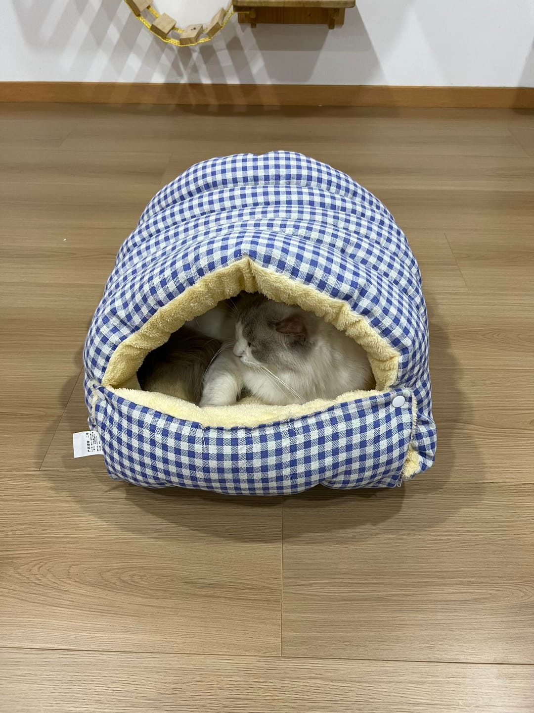 Customer photo review of Cozy Cave Pet Nest - A Snug, Washable Haven for Your Furry Friend