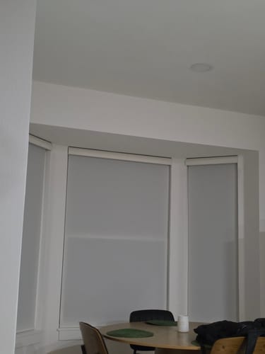 Customer photo review of SmartWings Motorized Light Filtering Roller Shades 70% Blackout Safari