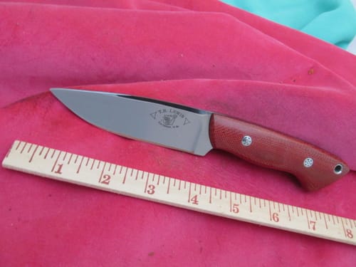 Customer's polished knife blade showing a mirror finish after using Premium Marpol Buffing Compound.