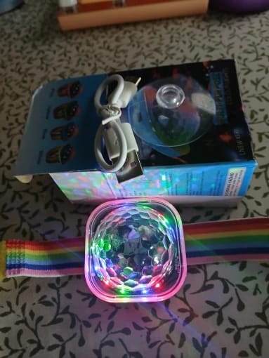 Customer photo review of Portable Wearable Wrist Ambient Disco Light - Sound-Activated Rechargeable RGB LED Wristband Stage Lamp for KTV, Party & Bar