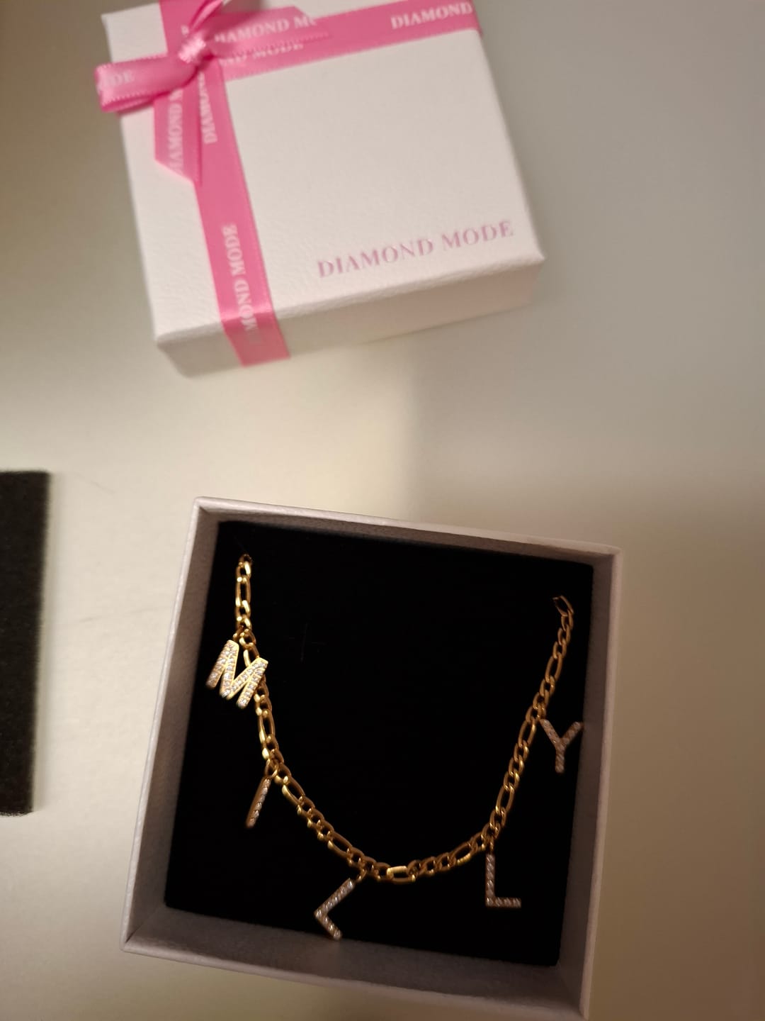Customer photo review of Namenskette | 18K vergoldet