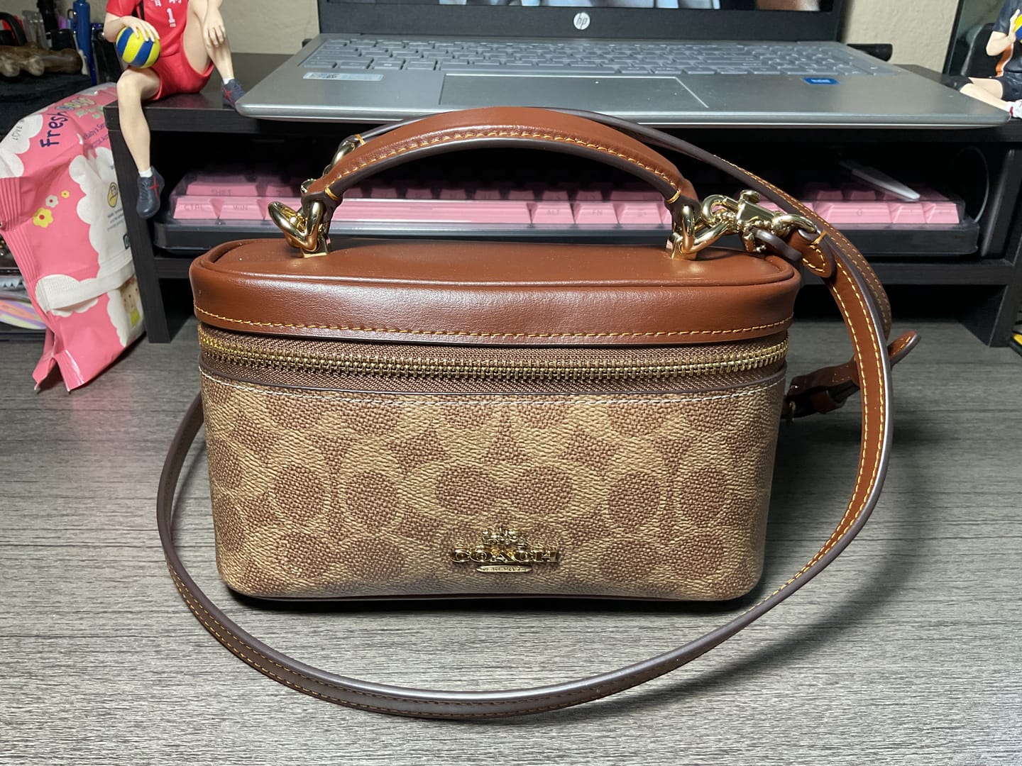 Customer photo review of Coach Rainer Crossbody Bag 18 In Signature Canvas In Tan Brown CEO23