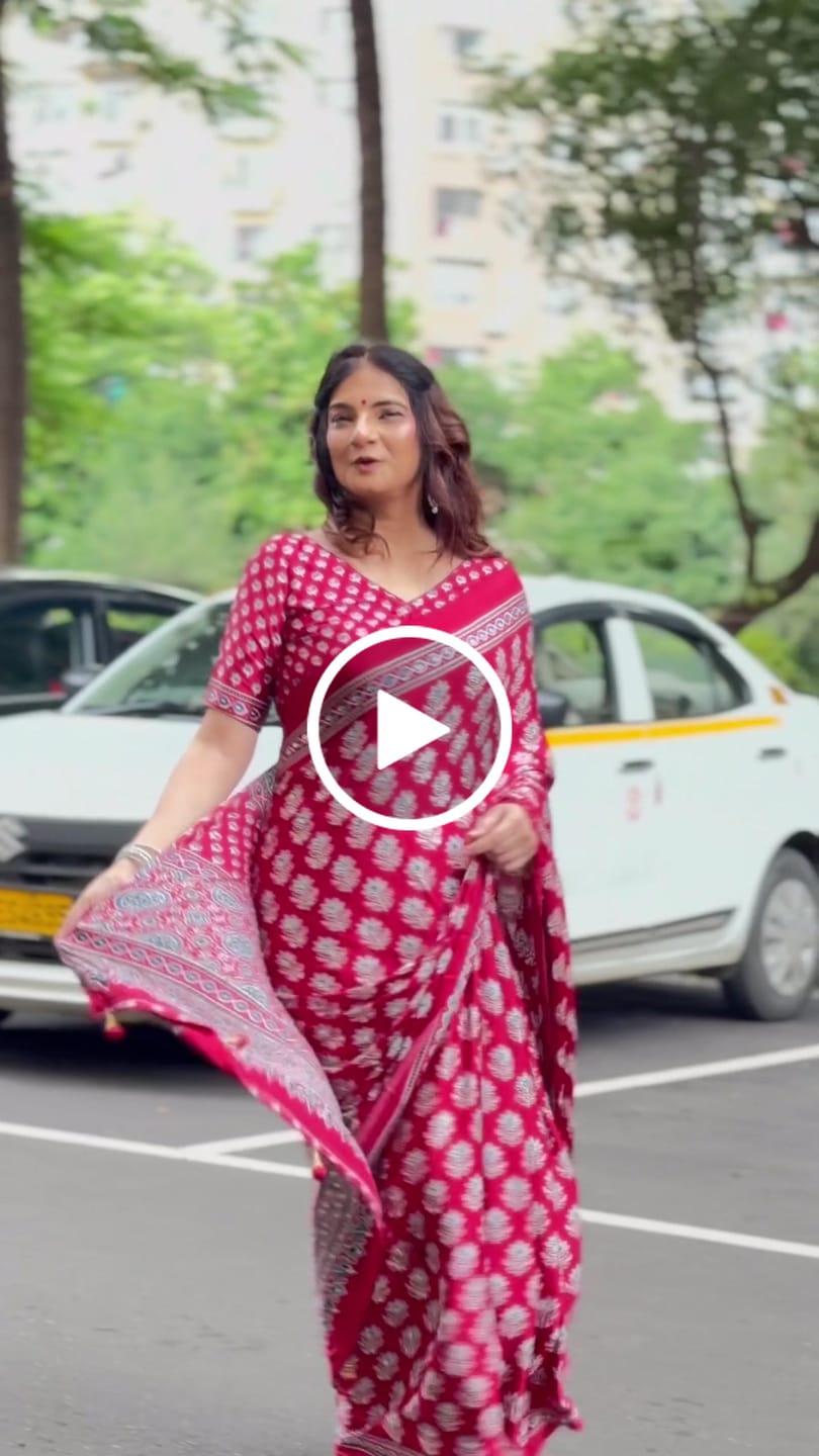 Customer video review of Wine Maroon Modal Ajrakh Satin Printed Mirror Work Saree