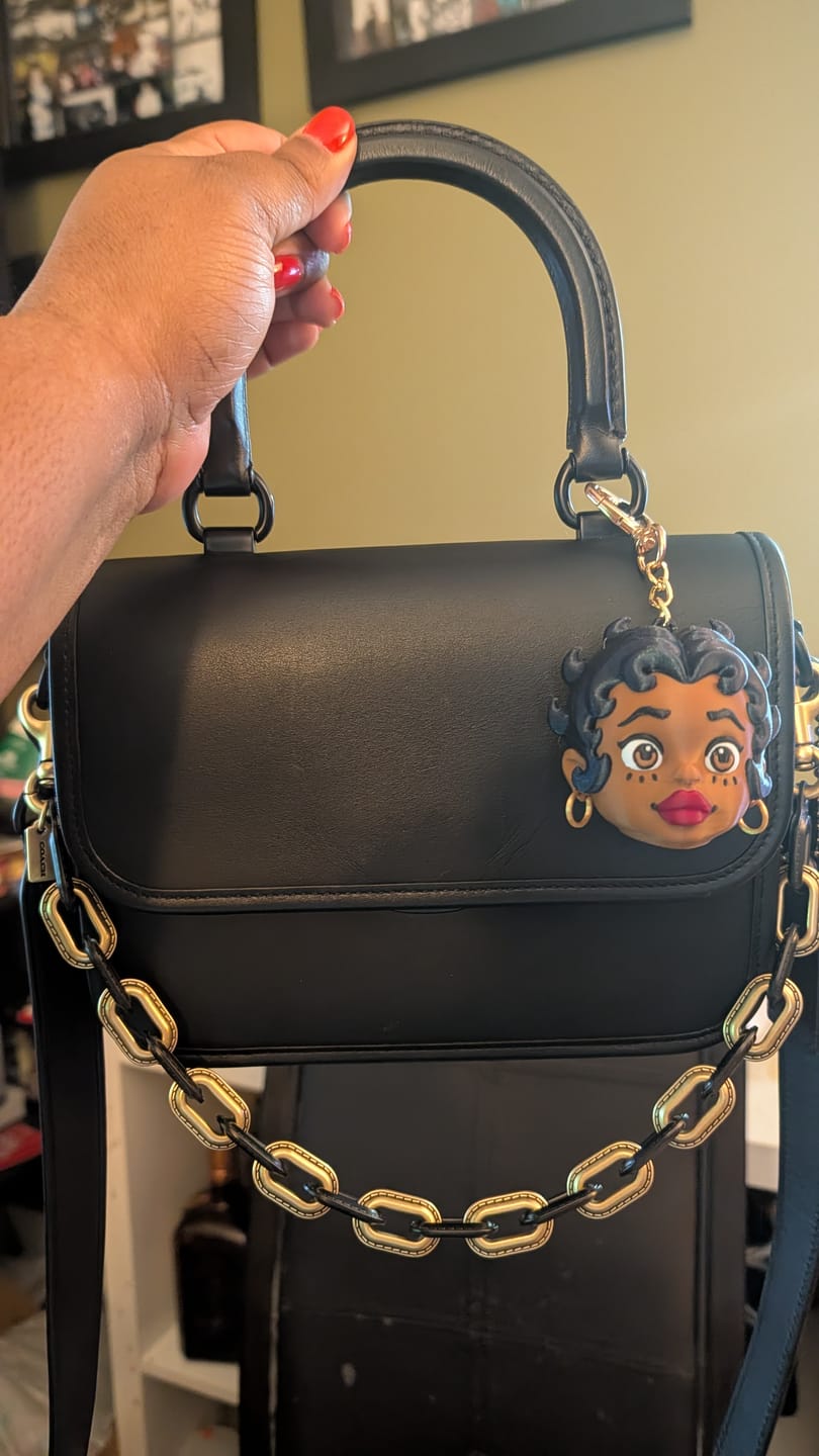Customer photo review of "Curly Temple" Toy Collectible Bag Charm