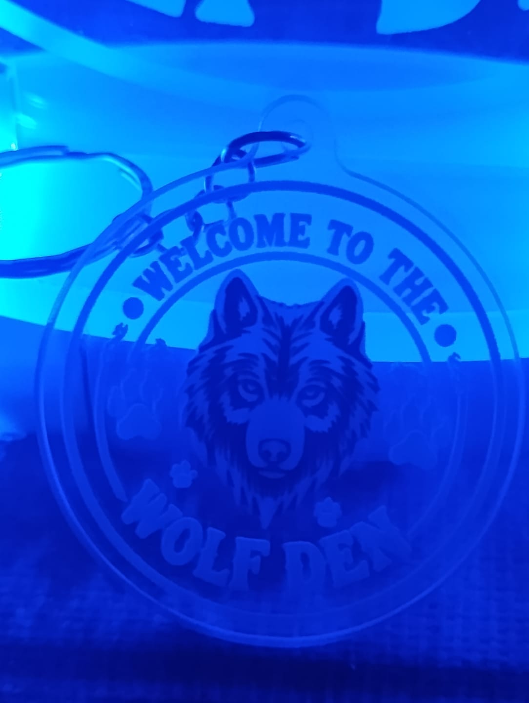 Customer photo review of 3 Tabletop Signs + 10 Keychains