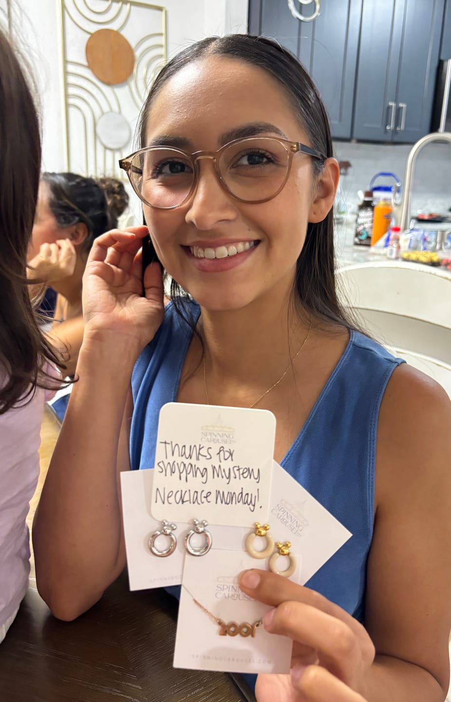 Customer photo review of Mini Leader of the Club Earrings