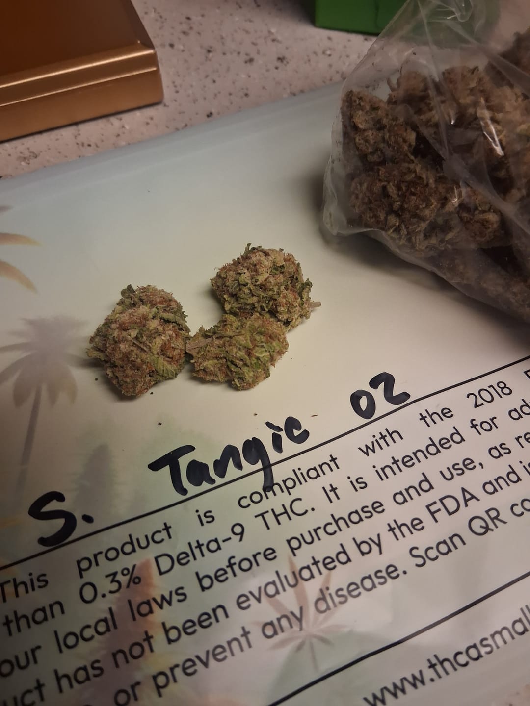 Customer photo review of Sour Tangie THCA Flower