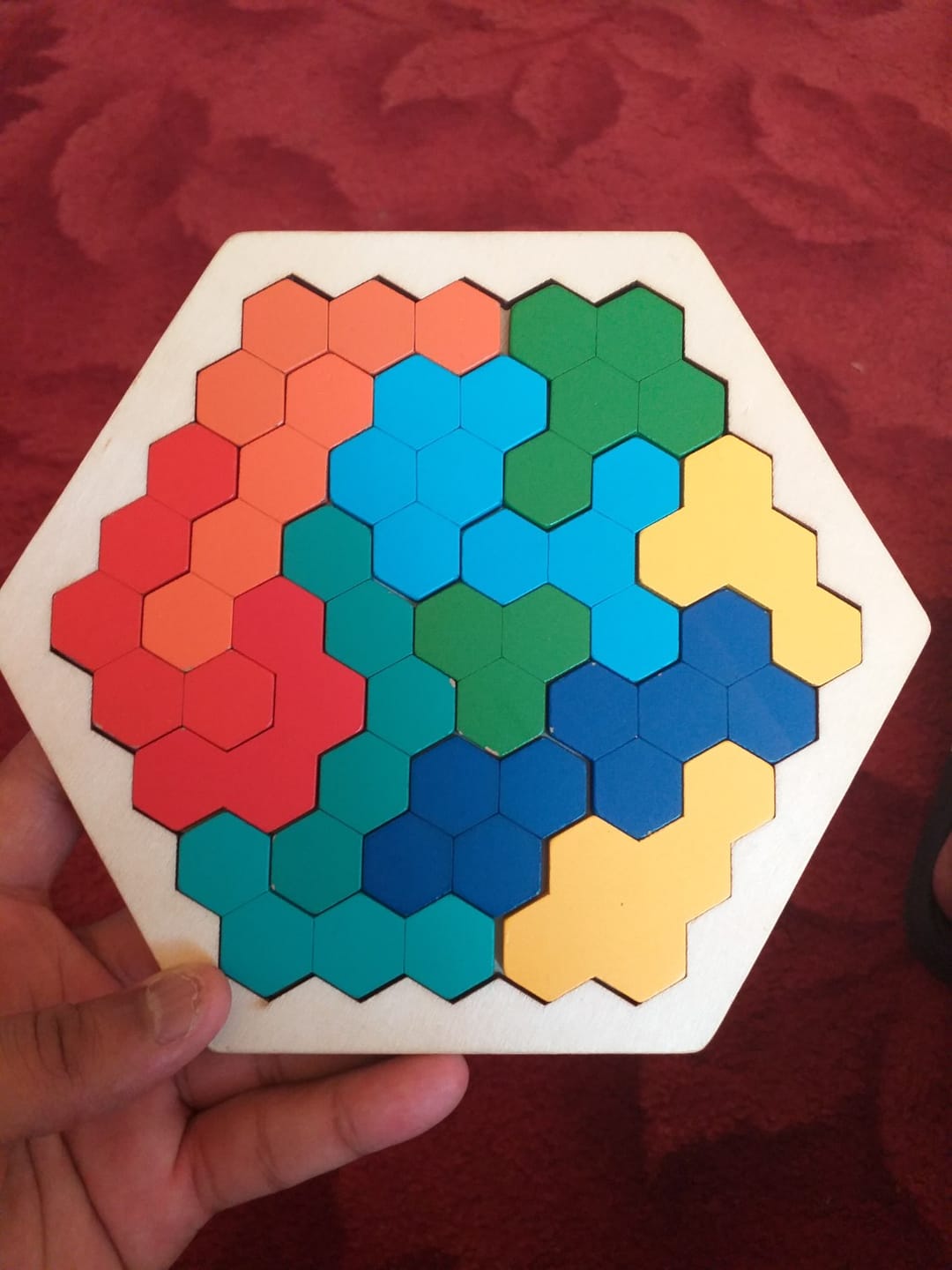 Customer photo review of Holz Hexagon Puzzle Lernspielzeug | Kognitives Motorikspiel Geometrie Kleinkind