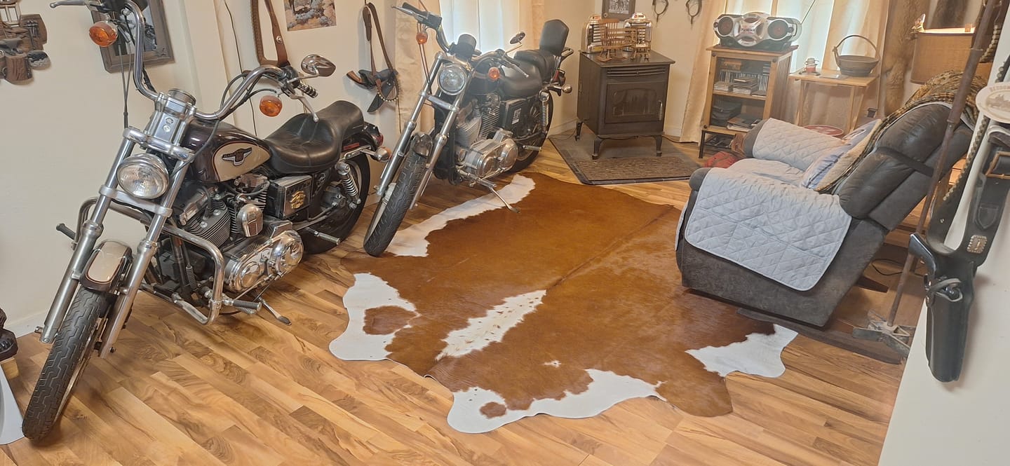 Customer photo review of SUPER SALE Brown & White Natural Cowhide Rug - XX-Large 8' 4"H x 7' 7"W