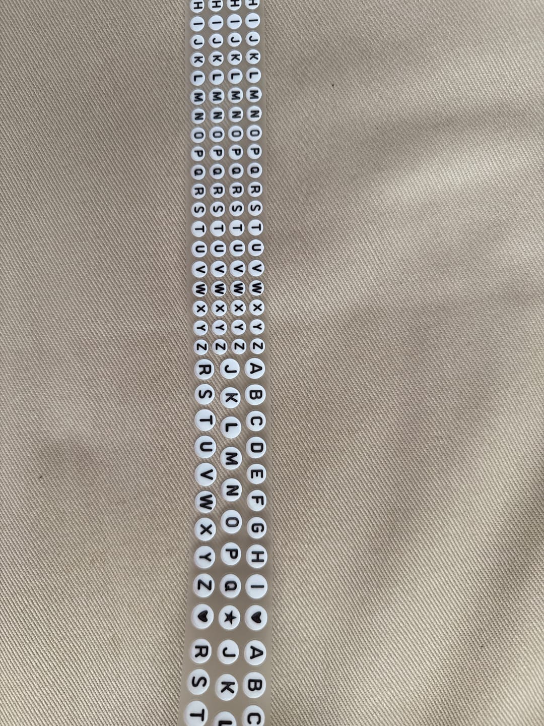 Customer photo review of Alphabet Beads Pre-cut PET Tape [3.O]