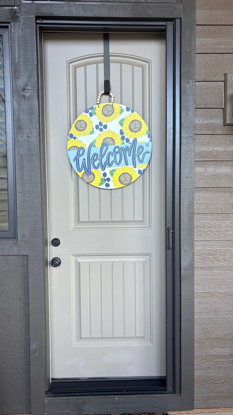 Customer photo review of Navy Sunflower Welcome Door Hanger
