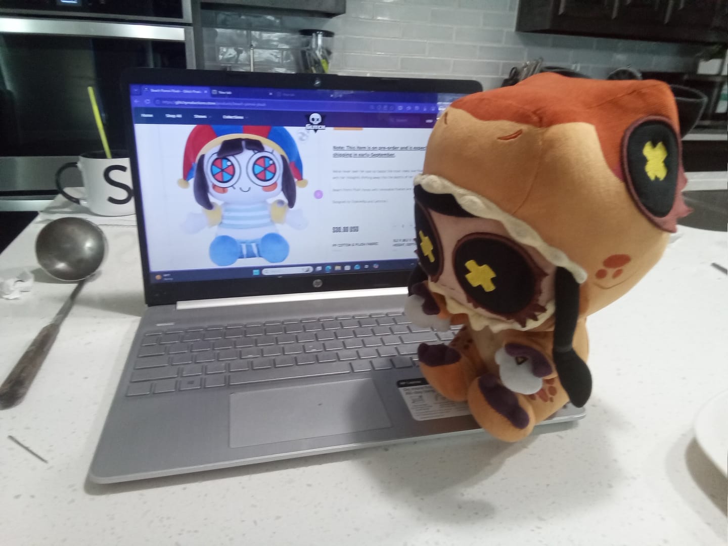 Customer photo review of Cyn T-Rex Plush
