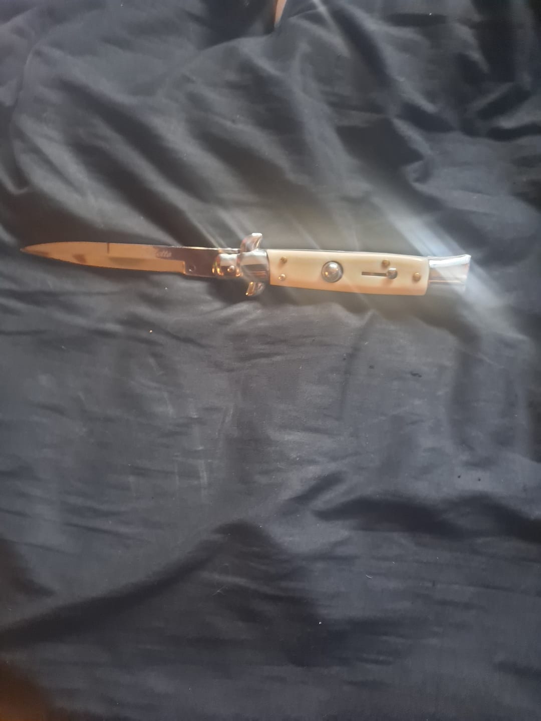 Customer photo review of 8.75" Italian Stiletto Switch Blade Pocket Knife