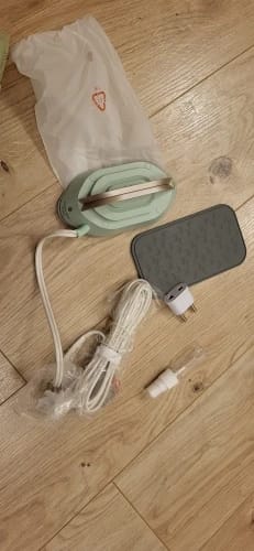 Customer photo review of THE MINI TRAVEL IRON PACK LIGHT. LOOK SHARP.