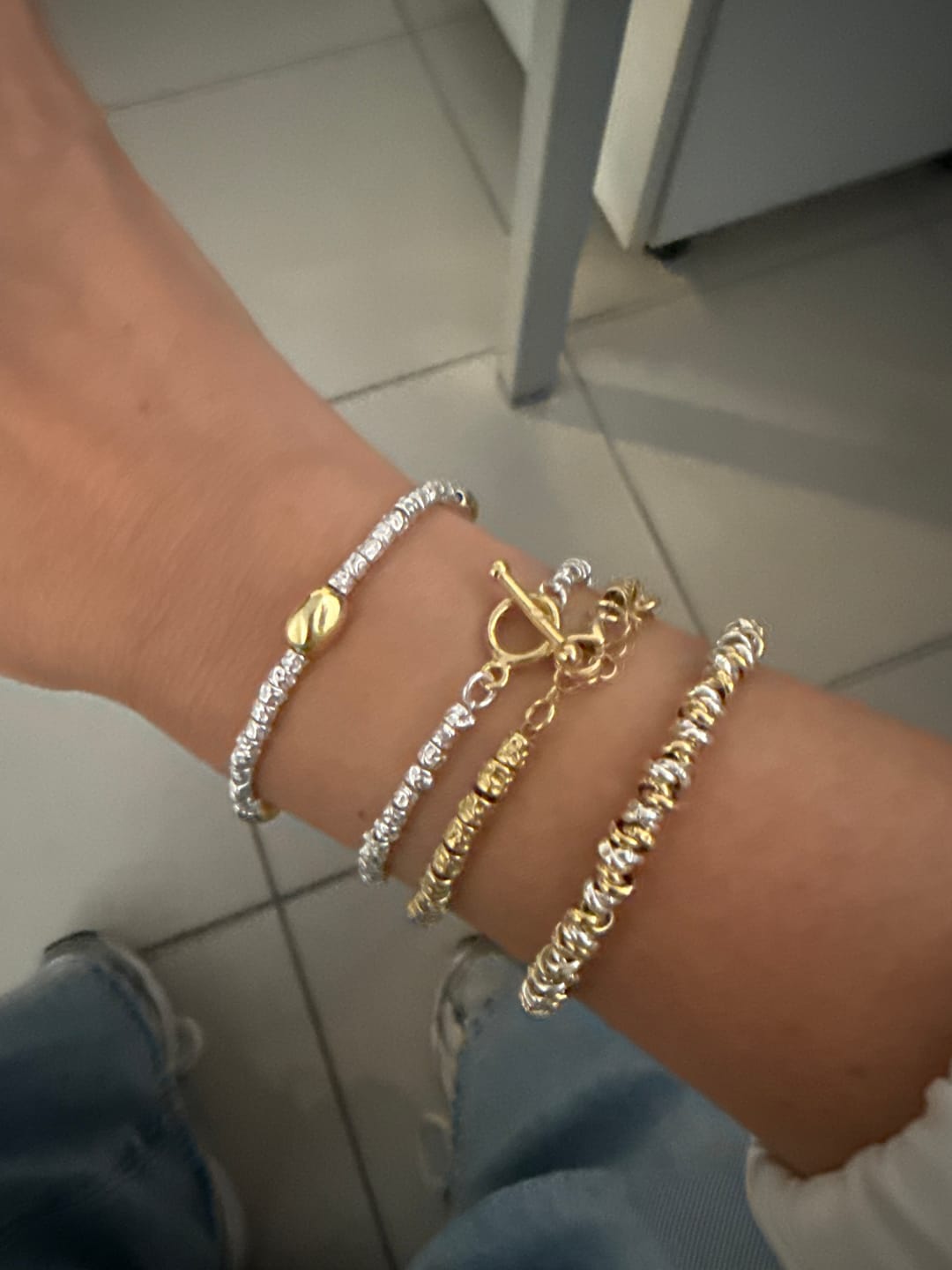 Customer photo review of Bracciale Trinity Oro